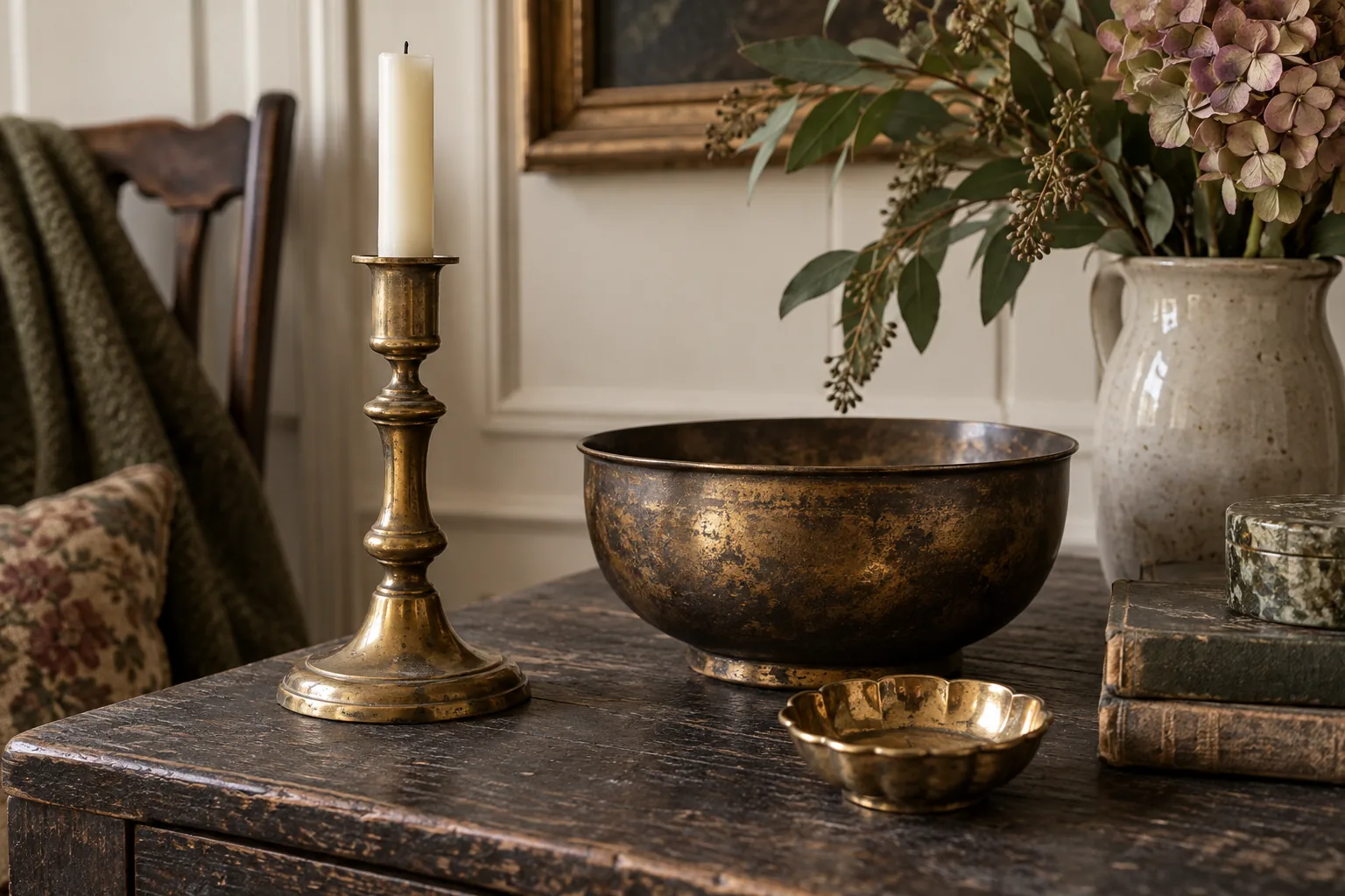 Brass candlestick, bowl and dish with differing natural patinas.